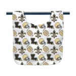 White fabric baby bib featuring a repeating pattern of gold and black New Orleans Saints fleur-de-lis, football helmets, footballs, and the state outline of Louisiana