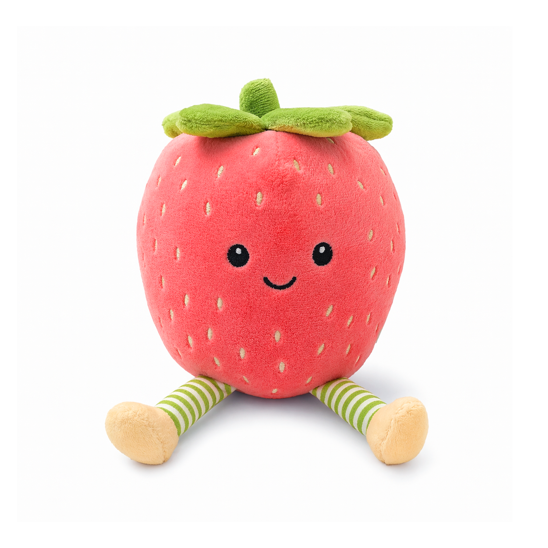 Plush toy a smiling red strawberry character with a green leafy top, embroidered light yellow seeds, black eyes and a curved smile, and green and white striped legs with tan feet on a white background