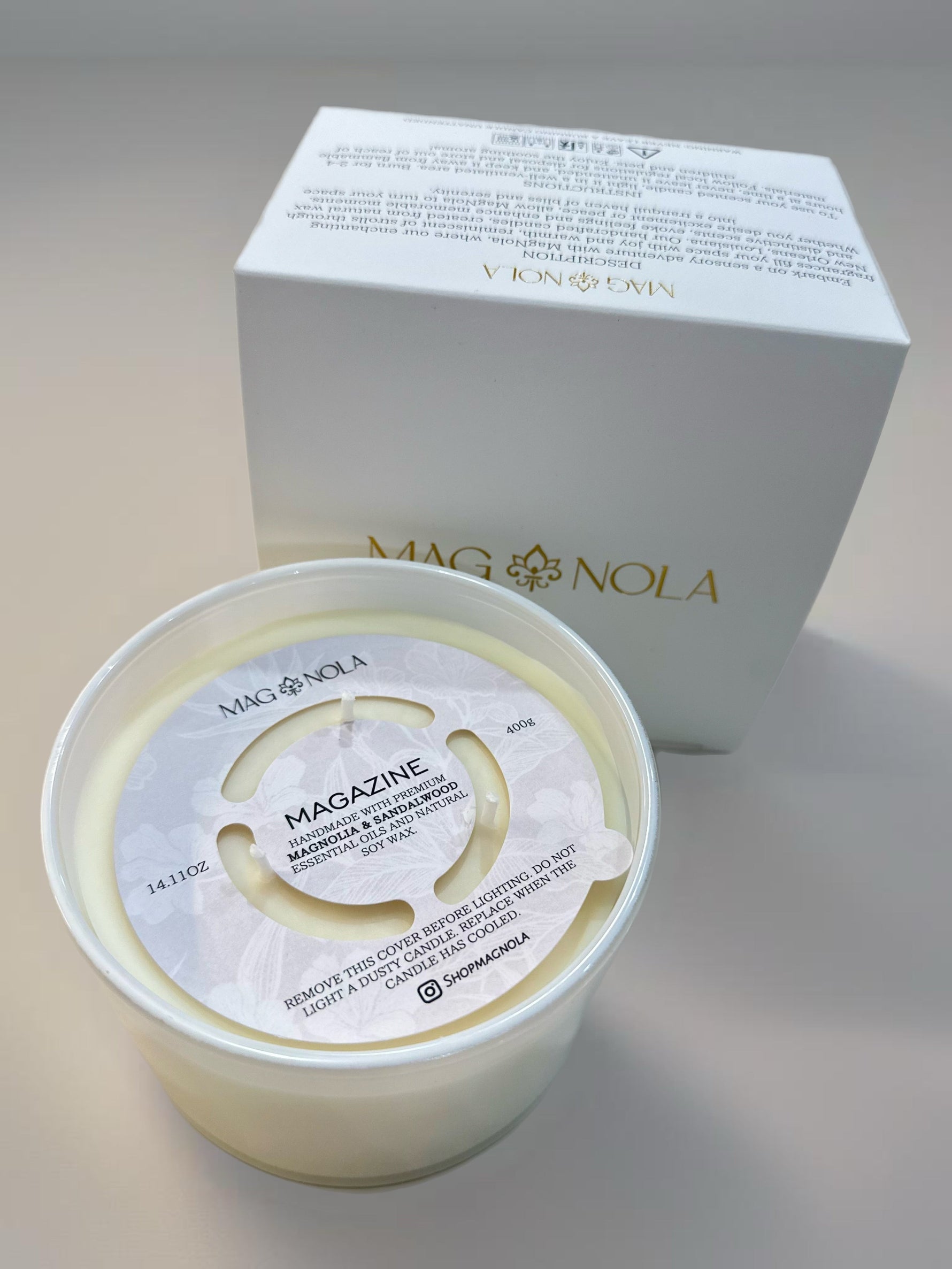 MagNola Magazine scented candle with protective cover and branded box
