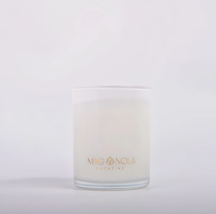 White glass candle with gold Magnolia Magazine logo