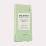 Digital image of a VOESH New York Mani Moments Green Tea Detox DIY At-Home Spa Manicure Kit in a light green speckled box featuring a Vegan Clean logo and listing a sugar scrub, cream mask, and massage butter as contents