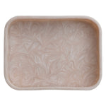 Light pink rectangular resin tray with rounded corners displaying a shimmering pearlescent swirled marble effect