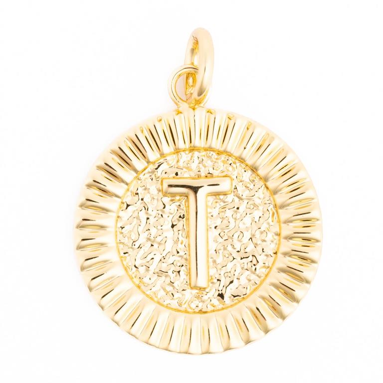 Golden round medallion pendant featuring a prominent raised capital letter T on a hammered texture background with a fluted border and a small attachment loop