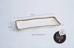 Porcelain Pampa Bay rectangular serving tray in white with a gold beaded edge measuring 13.75 by 6.25 by 1 inch and highlighted with "It's Porcelain" branding