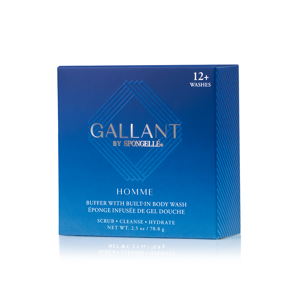 Product photograph of a blue ombre Gallant by Spongellé Homme Buffer with Built-in Body Wash box featuring a silver Gallant logo, "12+ Washes" text, and a reflective base on a white studio background