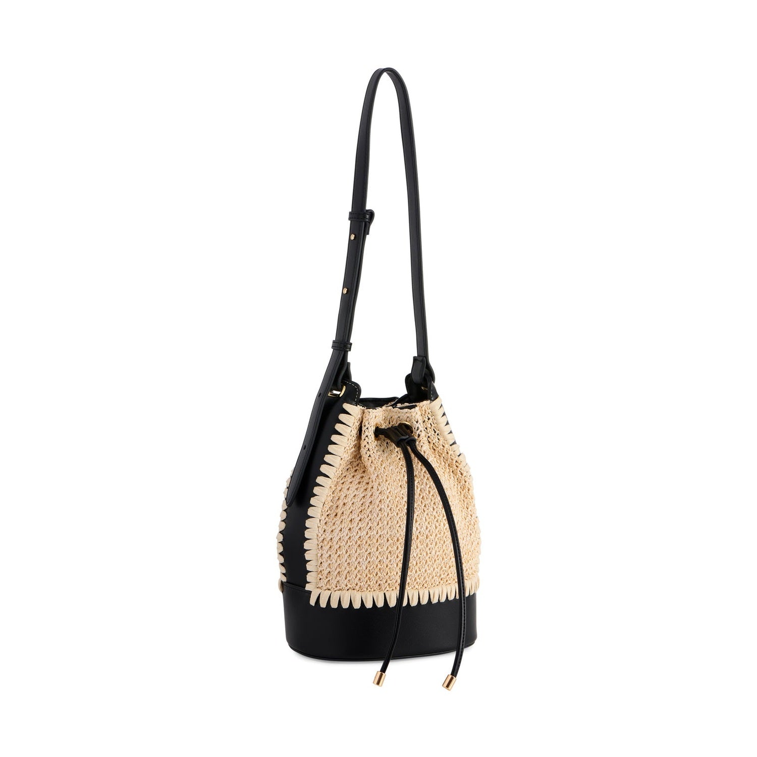 A stylish black leather and natural woven raffia bucket bag featuring a distinct scalloped edge, an adjustable shoulder strap, and black drawstrings with elegant gold tips