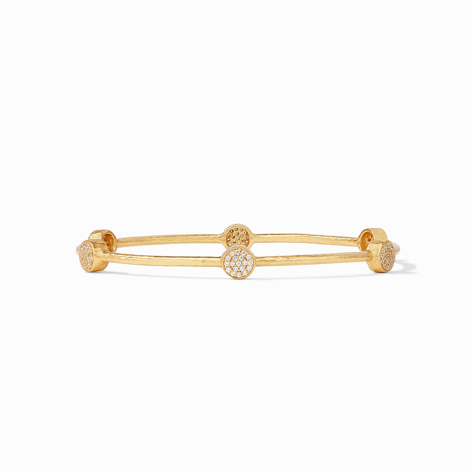 Gold bangle bracelet with four circular stations featuring pave set white stones
