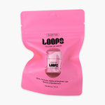 A vibrant pink Loops Double Take Glow Lip Mask pouch with a clear window showing the product, featuring the Loops logo and the benefits statement Glow Hydrate Refine & Brighten Lips Before a Rendezvous