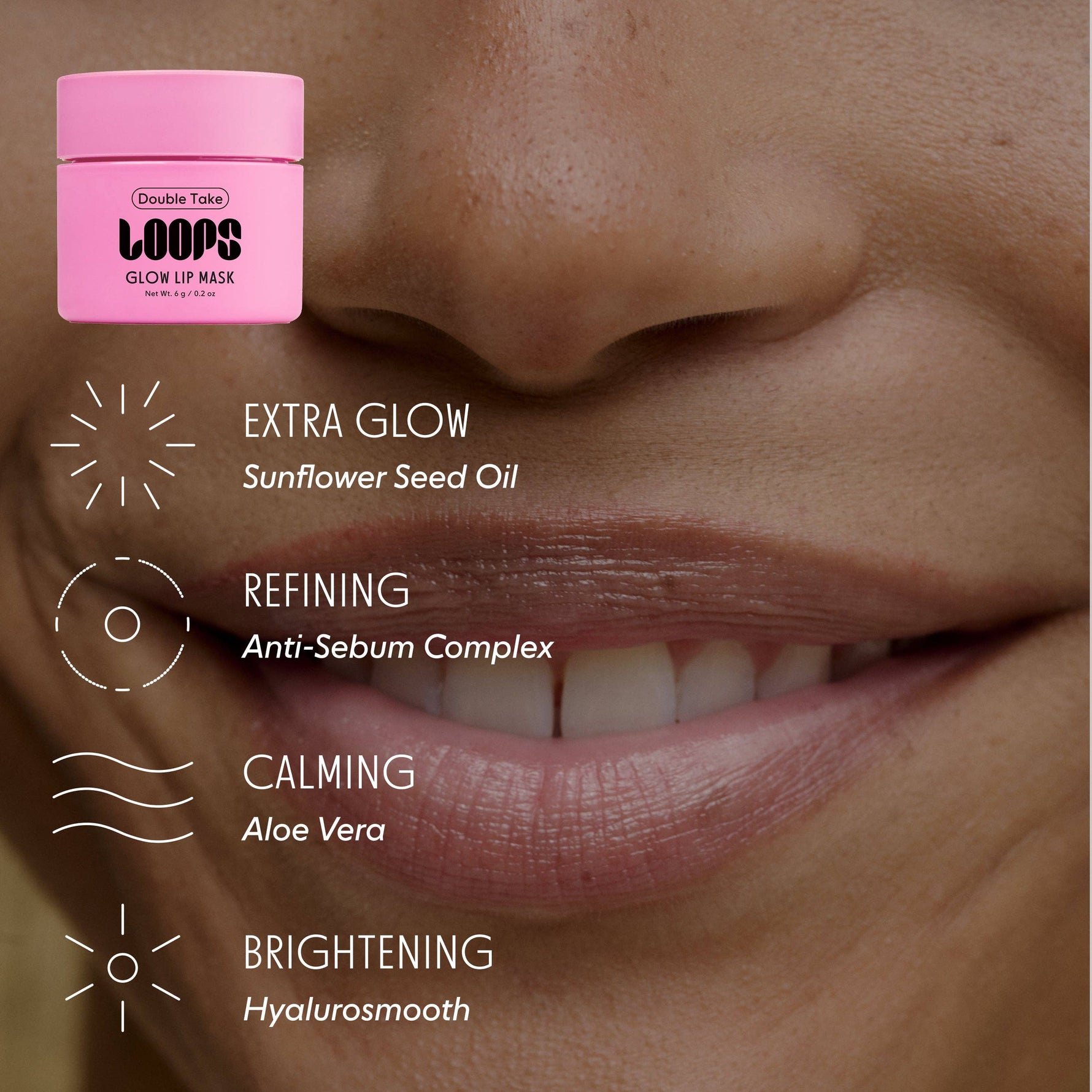 Photography of a smiling person's lower face featuring a vibrant pink Double Take LOOPS Glow Lip Mask container and white text detailing benefits like extra glow refining calming and brightening