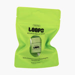 Loops Fresh Peel Resurfacing Lip Mask in a vibrant lime green stand-up pouch featuring the black Loops logo a clear window and text detailing its exfoliating benefits on a white background
