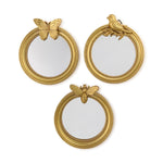 A set of three round gold-framed decorative mirrors, each adorned with a distinct golden butterfly, a bird on a branch, or a bee figure, with intricate beaded inner edges