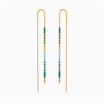 Gold threader earrings a pair of minimalist gold threader earrings featuring delicate gold chains and bars with sections of small rectangular beads in a vibrant ombre gradient of dark green light green light blue and teal
