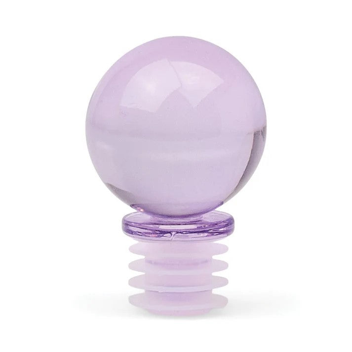 Translucent lavender glass sphere bottle stopper with a ribbed silicone base on a white background