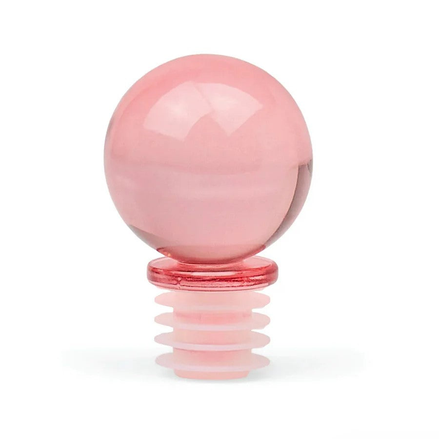 Translucent pink spherical glass bottle stopper with a ribbed silicone base