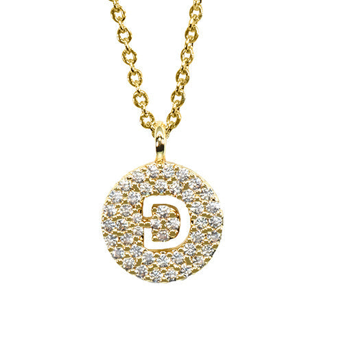 Gold pavé disc necklace with a cutout initial D