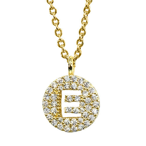Gold pavé disc necklace with a cutout initial E