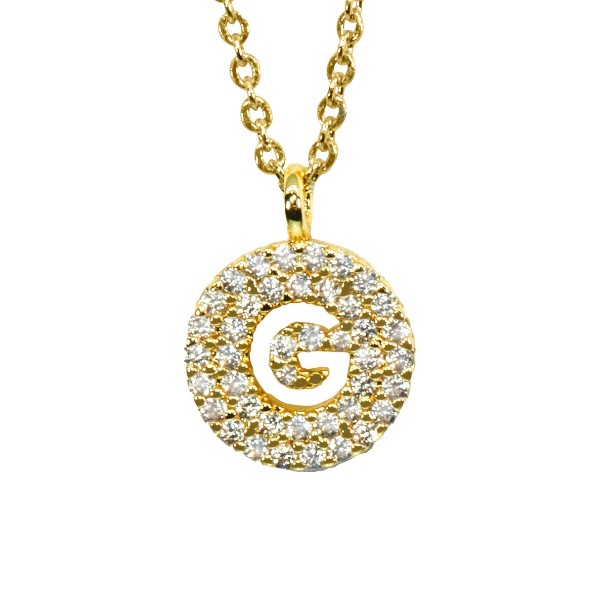 Gold pavé disc necklace with a cutout initial G