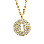Gold pavé disc necklace with a cutout initial I