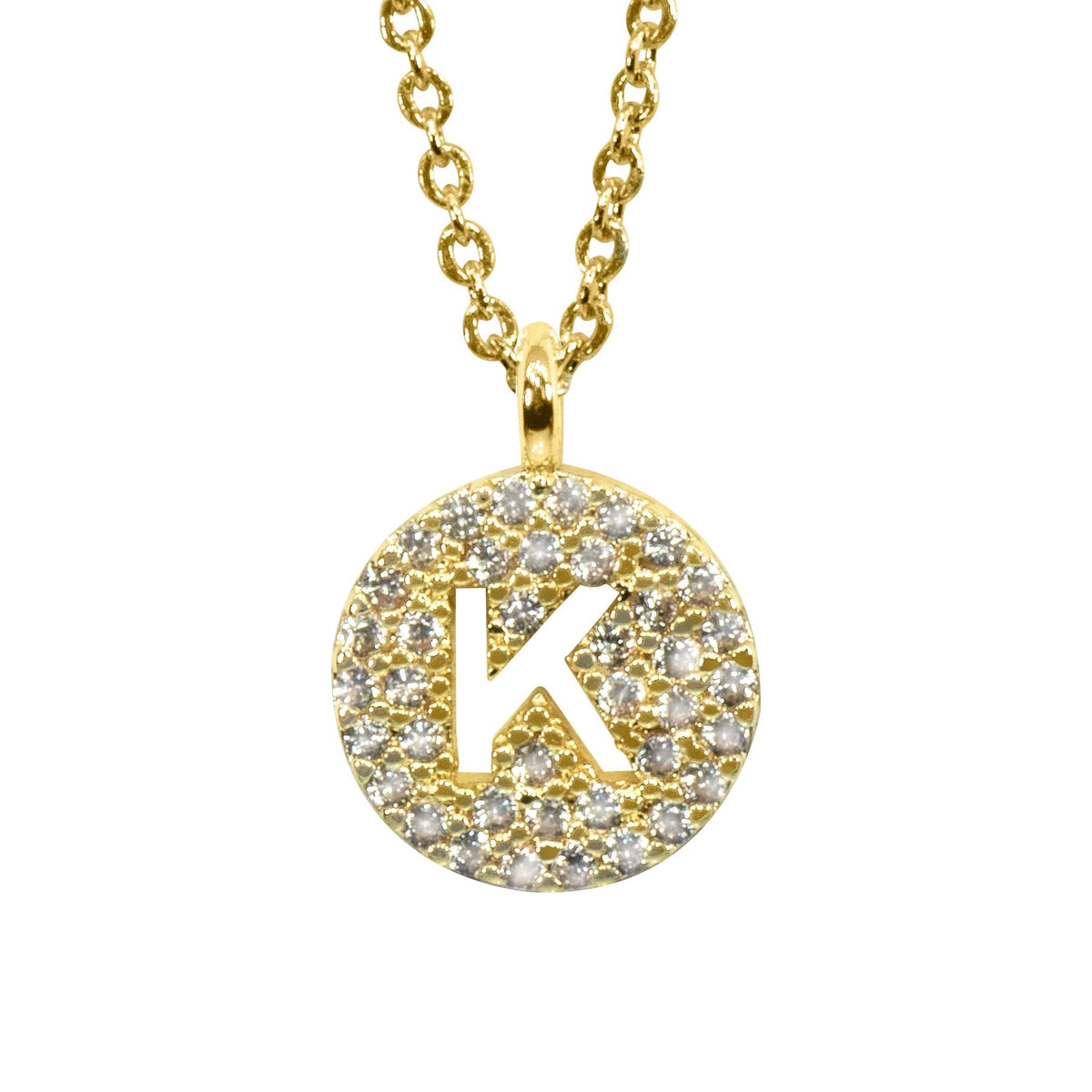 Gold pavé disc necklace with a cutout initial K