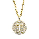 Gold pavé disc necklace with a cutout initial T