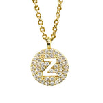 Gold pavé disc necklace with a cutout initial Z