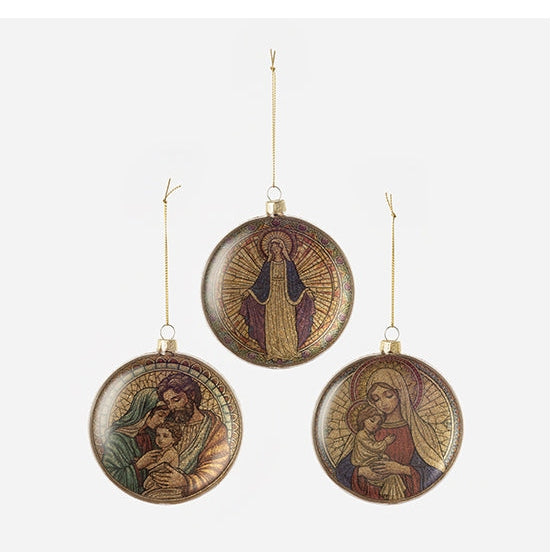 Three round Christmas ornaments featuring religious illustrations of the Holy Family and the Virgin Mary