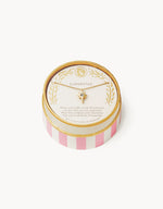 A gold-plated "SUPERSTAR" star pendant necklace with a clear gem displayed in a round pink and white striped gift box, adorned with an inspirational quote