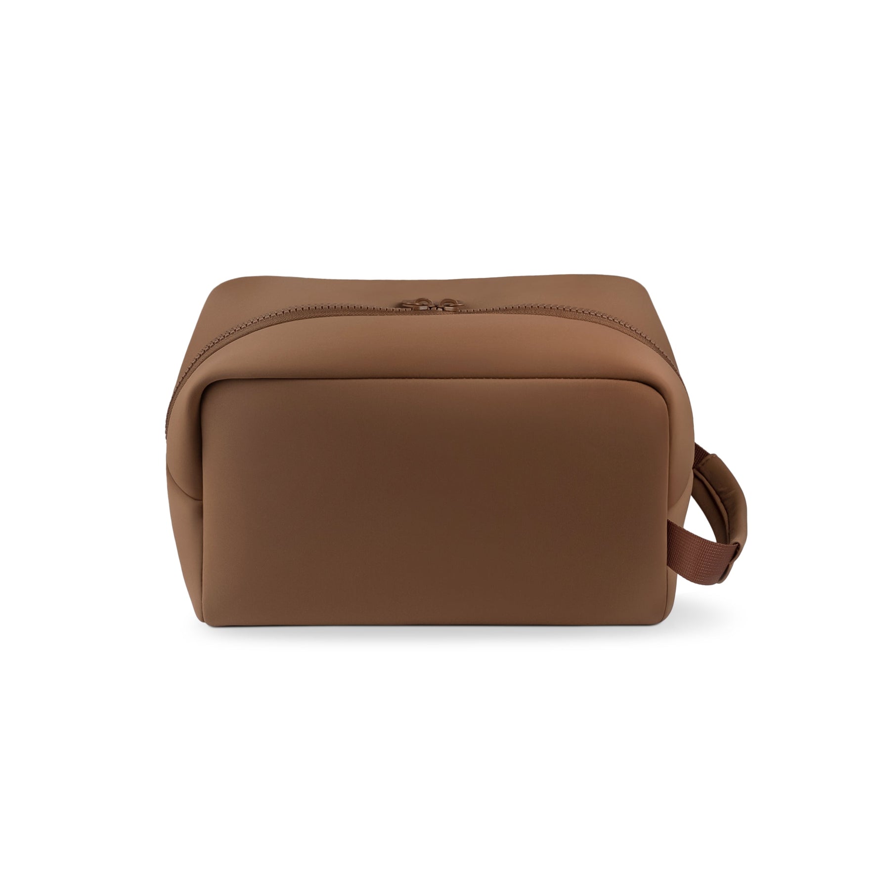 Product photograph of a rectangular deep brown toiletry bag made of smooth structured material, featuring a top zipper with two pulls and a fabric loop handle on the side