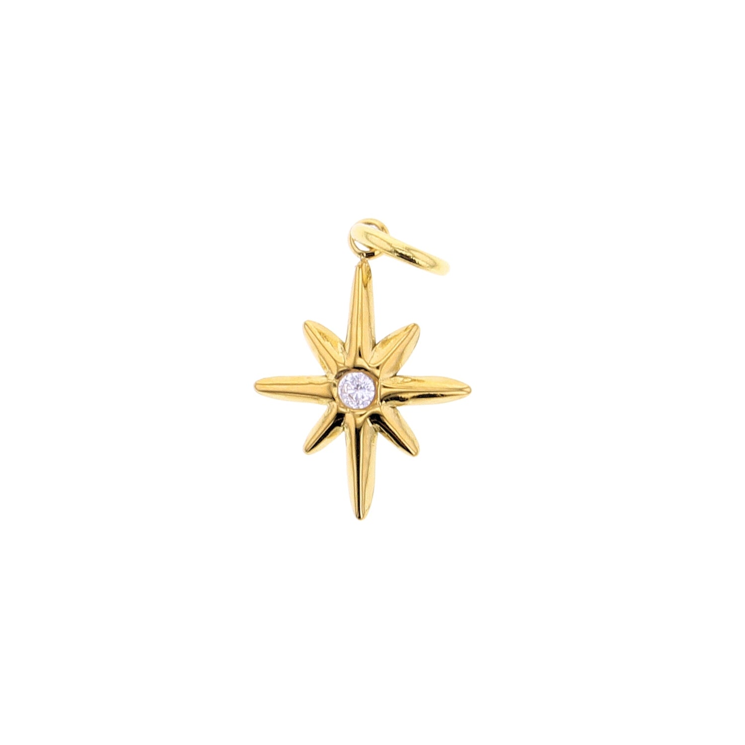 Gold charm featuring an eight-point North Star design with a brilliant round diamond center and a polished finish