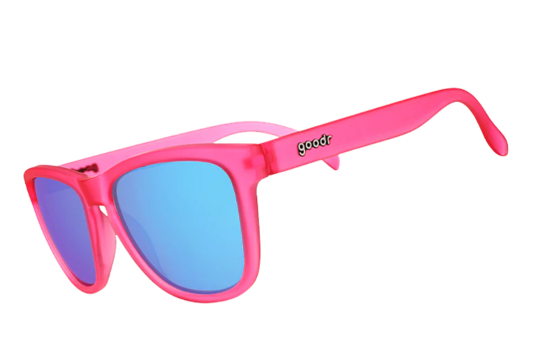 Product image of Goodr square-frame sunglasses featuring a vibrant frosted hot pink frame and striking reflective blue lenses with the brand logo on the arm