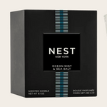 NEST NEW YORK Ocean Mist & Sea Salt scented candle box in black packaging featuring a vertical stripe of thin white and teal lines and stating 8.1 oz