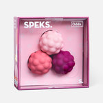 Three textured silicone magnetic balls in pink and purple shades inside a square retail box