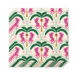 Printed decorative pattern with vibrant pink leopards climbing green palm trees featuring golden coconuts amidst dotted geometric designs and light pink flowers on a cream background