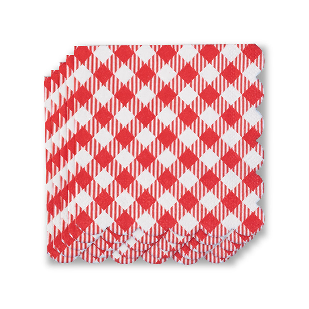 Photograph of a stack of red and white checkered paper napkins featuring decorative scalloped edges and a diagonal gingham pattern on a clean white background