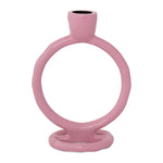 Ceramic pink glossy abstract ring-shaped candle holder with a top opening and organic base