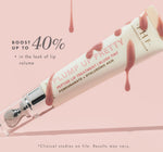 Farmhouse Fresh's Plump Up Pretty Peptide Lip Treatment Blush Tint tube is shown with pink drips and a rollerball applicator on a soft pink background, promising up to a 40% boost in lip volume with pomegranate and hyaluronic acid