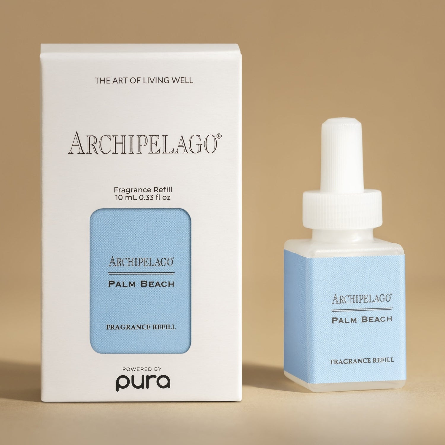 Product photography by Archipelago featuring a Palm Beach Fragrance Refill 10 mL in its white box packaging with a light blue label and "Powered by Pura" branding