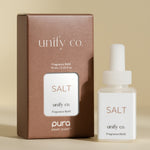 Product photography of a Unify Co. Salt fragrance refill set, featuring a brown textured box and a white plastic refill bottle, both marked with 'SALT' and 'unify co.', indicating Pura Smart Scent compatibility and a 10ml volume, presented against a warm beige background