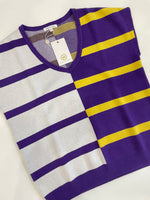 Mary Square knitwear V-neck top featuring a unique color-blocked design with wide horizontal stripes, combining white and purple on the left and vibrant purple and yellow on the right, with the brand tag visible