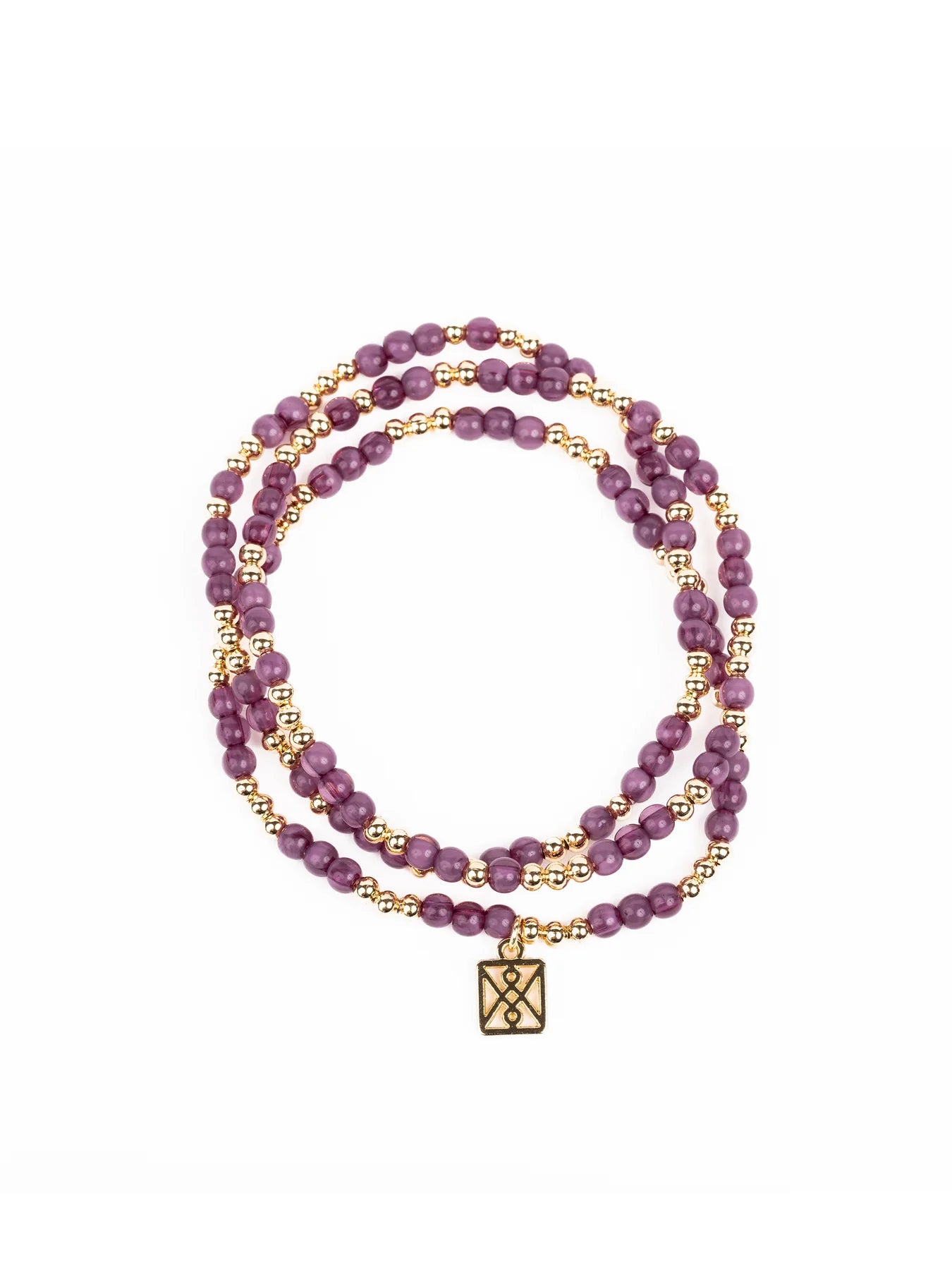 A three-strand wrap bracelet featuring shiny purple beads alternating with small golden spacer beads and a square golden charm with an intricate geometric symbol