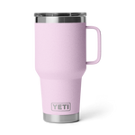 Product photograph of a light pink YETI Rambler 30 oz travel mug with a textured finish, stainless steel accents, clear lid, integrated handle, and the YETI logo