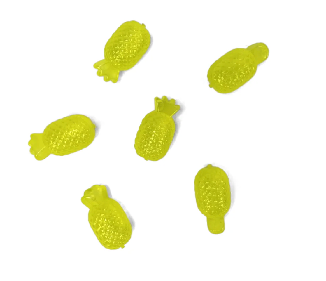 Six yellow plastic pineapple shaped beads