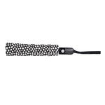 A folded compact umbrella featuring a black and white irregular polka dot pattern a dark grey handle with a white button and a black wrist strap presented against a clean white background