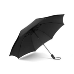 A black open folding umbrella angled on a white background with a distinctive black loop handle