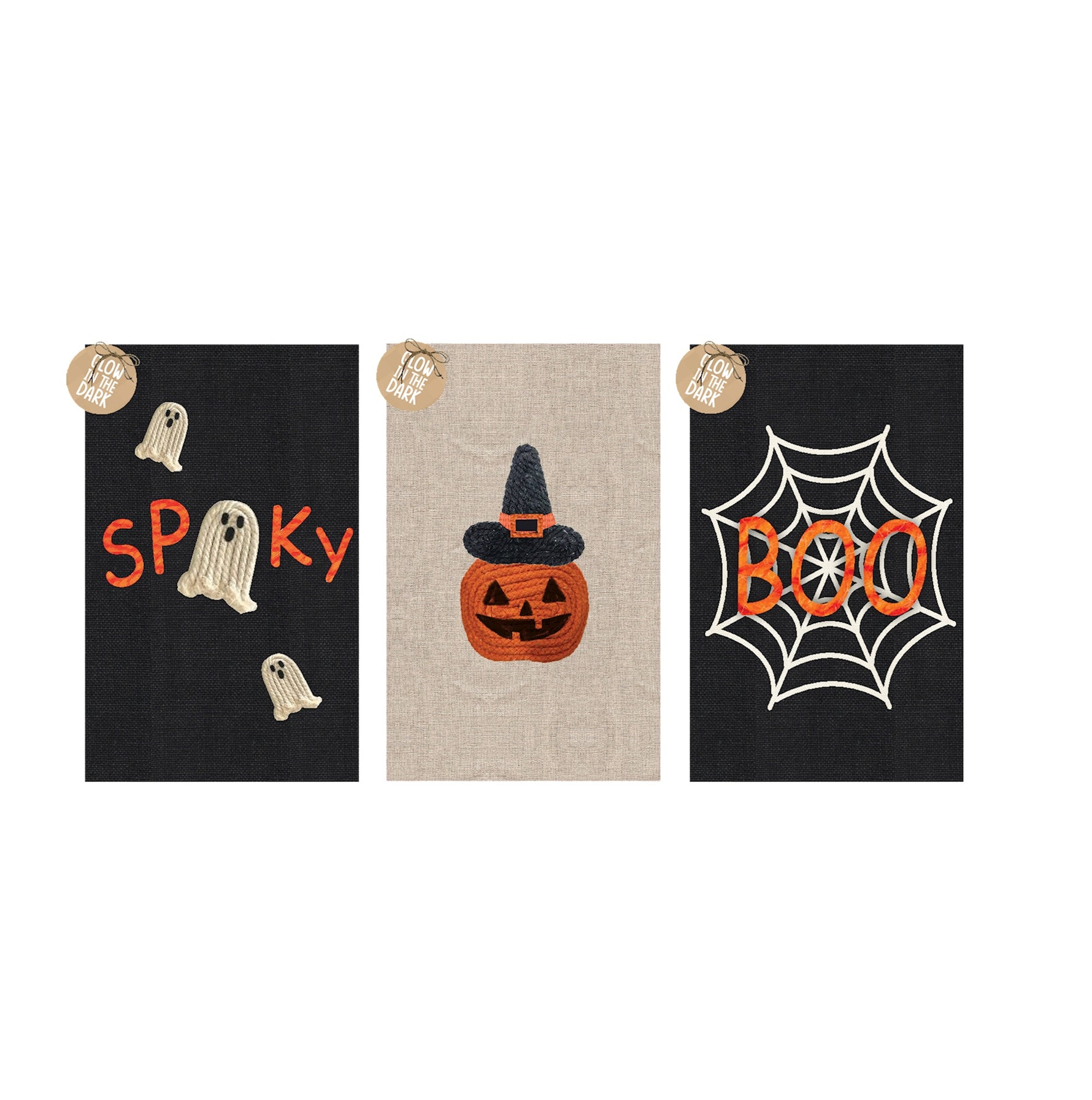 Three glow-in-the-dark Halloween themed decorative textile panels depicting an orange 'Spooky' with white rope ghosts on black fabric, an orange rope pumpkin with a black witch hat on beige fabric, and an orange 'Boo' over a white spiderweb on black fabric