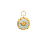 Gold charm pendant featuring a detailed bee relief on an iridescent mother-of-pearl inlay framed by a textured bamboo-style gold border