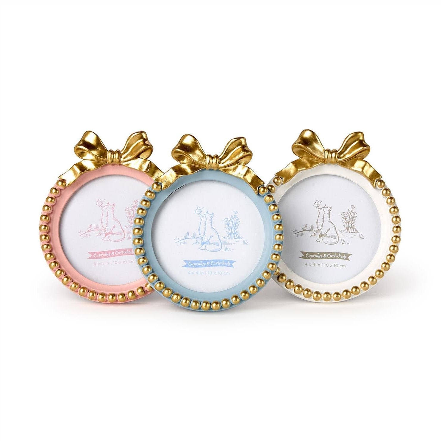 Three decorative round photo frames, one pink, one baby blue, and one white, each with a gold beaded rim and a large gold bow, featuring a line drawing of a fox and butterfly, presented on a white background