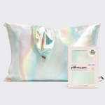 A Kitsch iridescent pastel holographic satin pillowcase with a matching tied sleep accessory alongside its pink packaging highlighting '600 thread count'