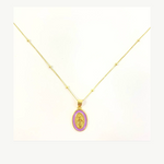 Gold tone beaded chain necklace featuring an oval pendant with a purple enamel border and a gold relief of the Virgin Mary