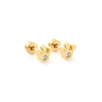 Gold-toned metal pair of crown stud earrings, each intricately designed with a sparkling clear cubic zirconia crystal